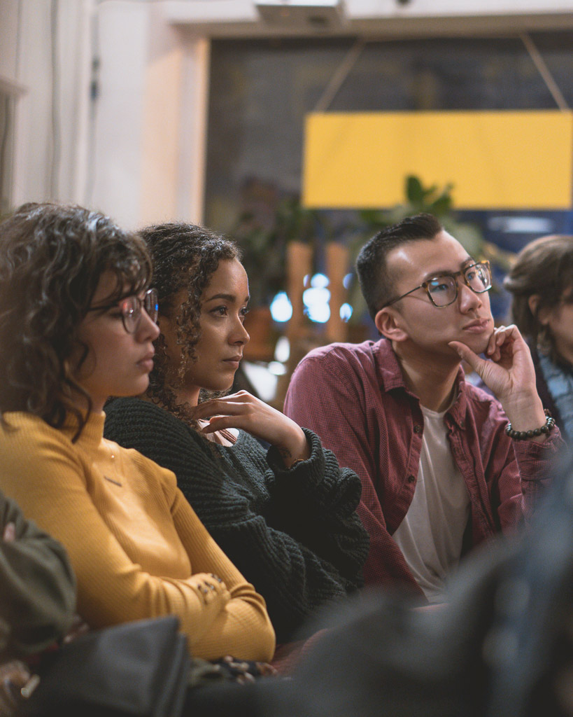 Audiences enjoy a reading of Seayoung Yim's "Untitled Play About Institutional Racism and the Nonprofit Industrial Complex"